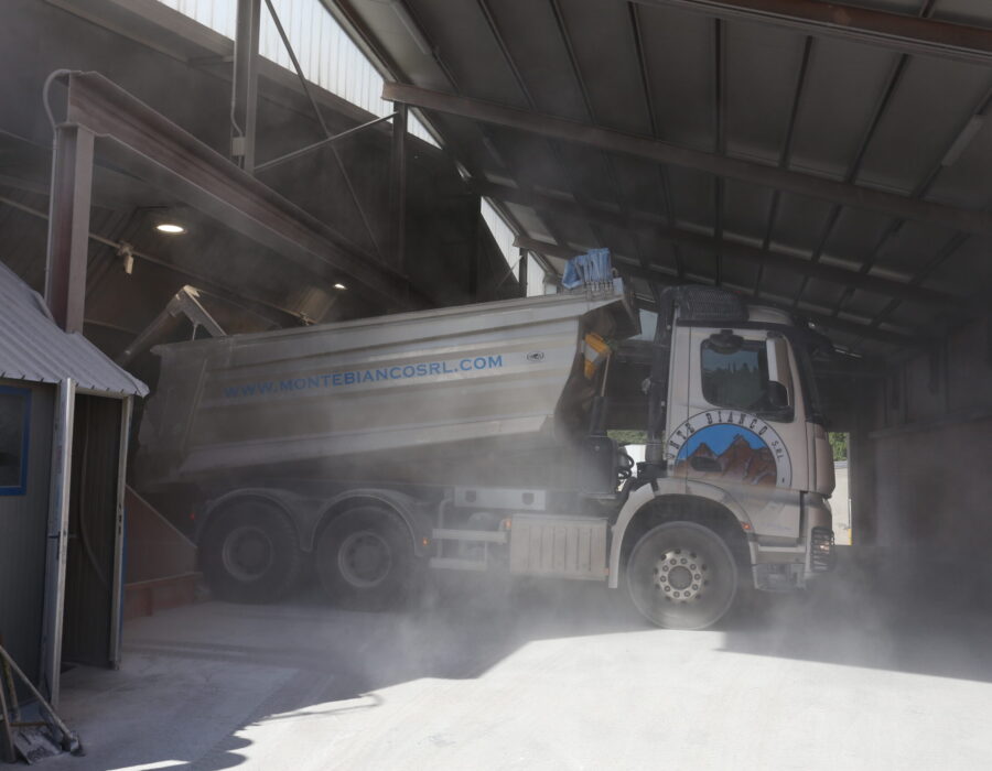 Aggregates are poured into hoppers.