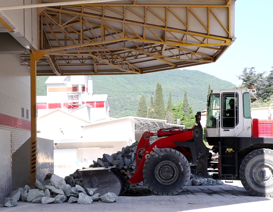 Stones are loaded into the crusher